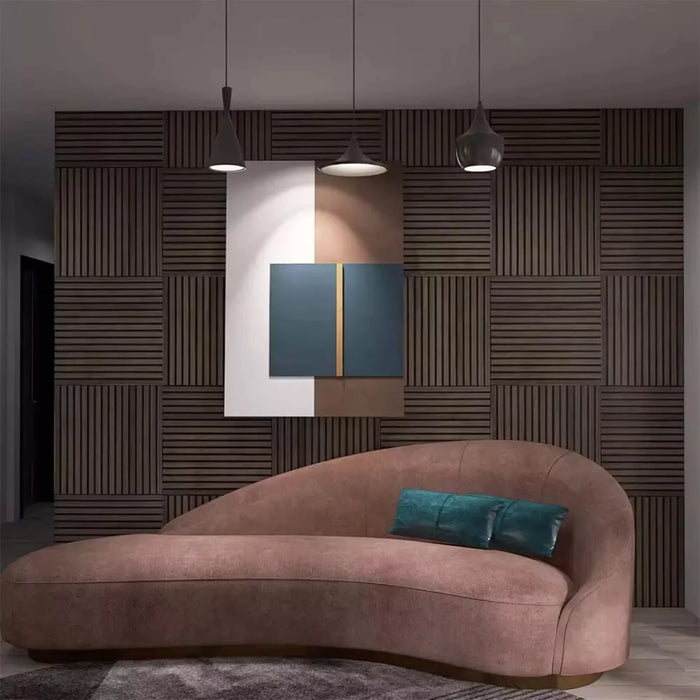 Modern living room with a brown sofa, decorative pillows, and a main feature or a walnut square slat wall.