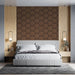 Modern bedroom with geometric headboard and minimal decor